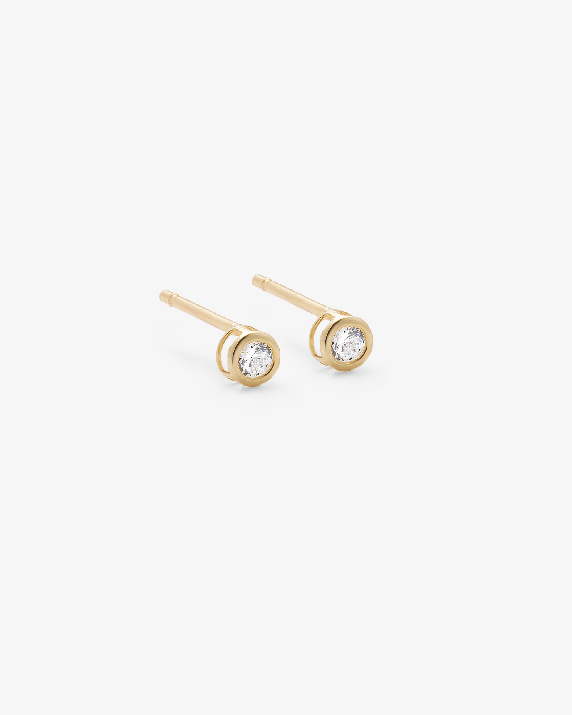 9K Yellow Gold Zirconia Bezel Stud Earrings