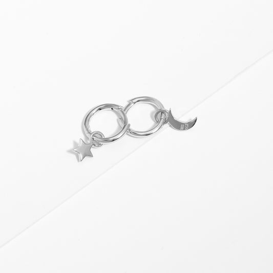 Sterling Silver Huggie Earrings With Dangling Star And Moon