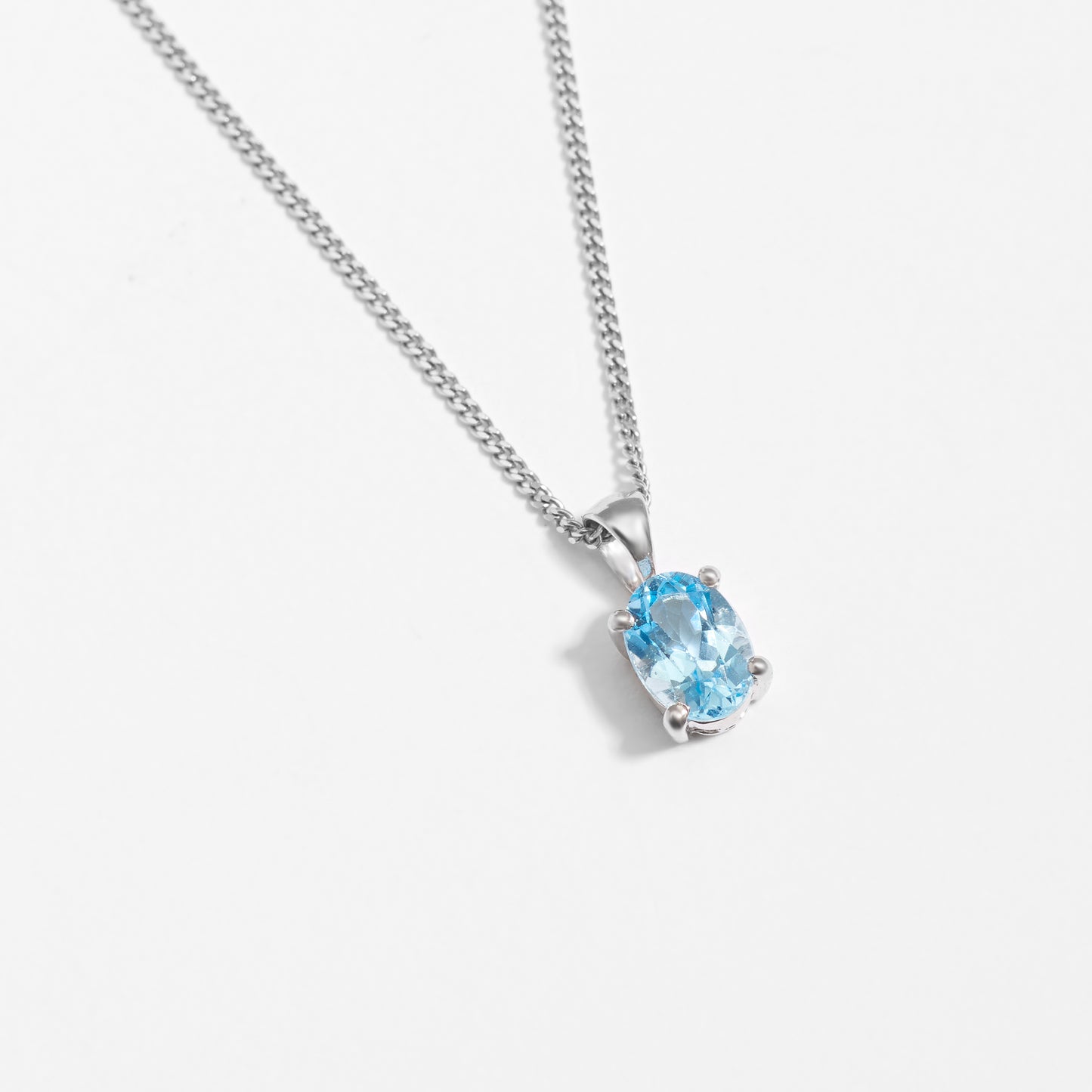 Sterling Silver Oval Swiss Blue Topaz December Birthstone Pendant