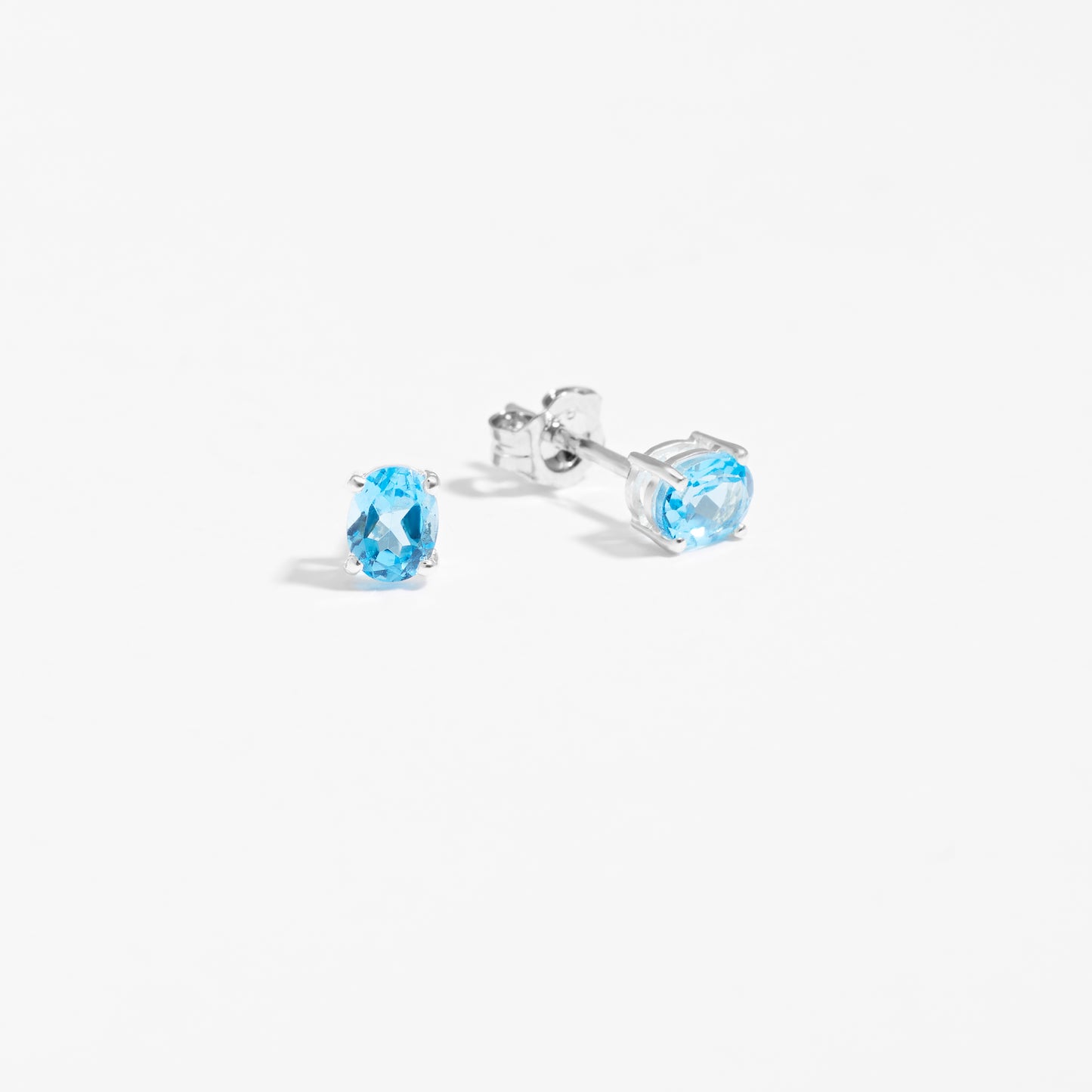 Sterling Silver Oval Swiss Blue Topaz December Birthstone Stud Earrings