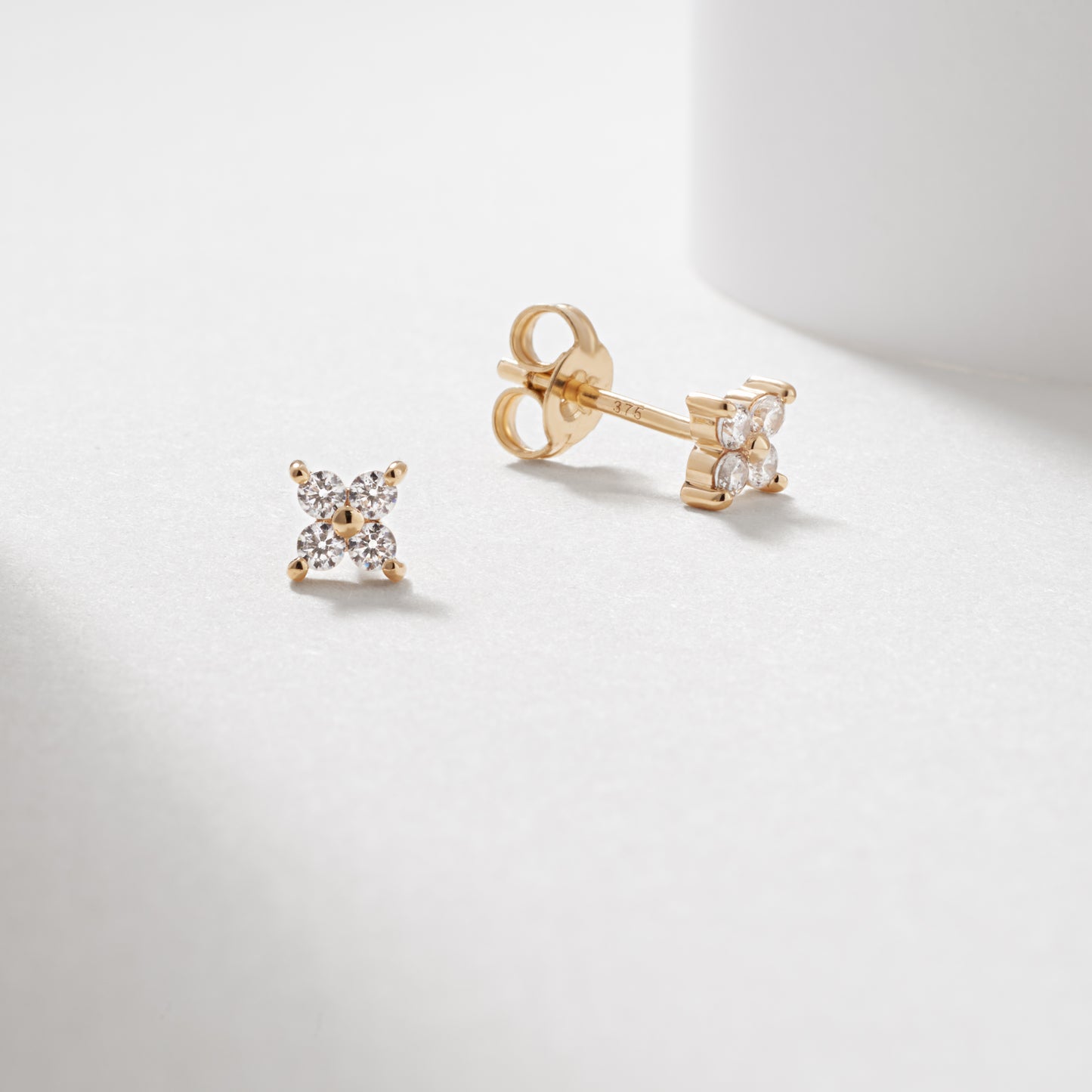 9K Yellow Gold Zirconia Flower Stud Earrings – Simon Curwood Jewellers