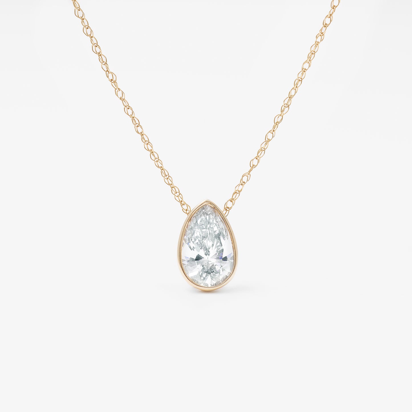 9K Yellow Gold 0.70ct Bezel Pear Lab Diamond Slider Pendant With Chain 45cm.