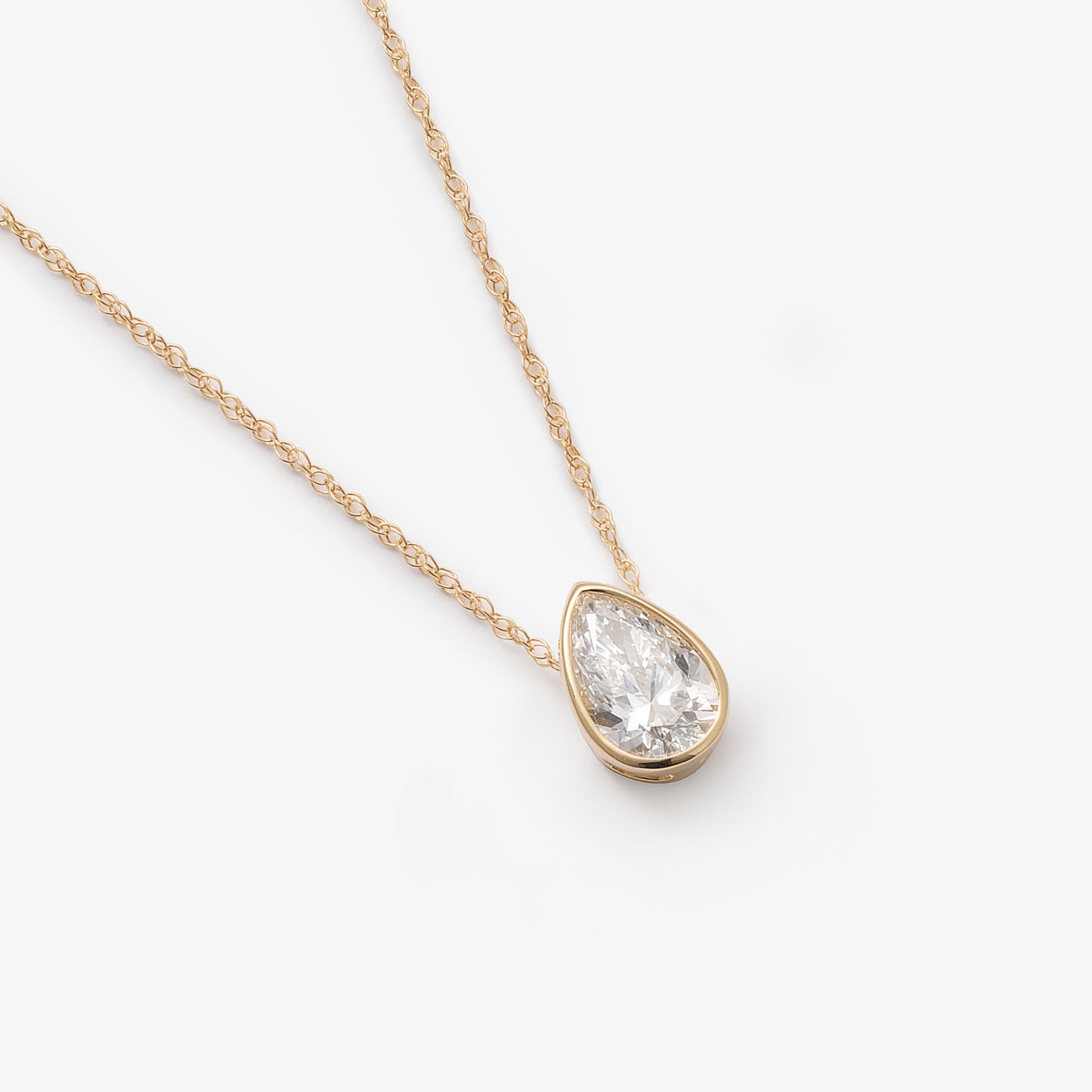 9K Yellow Gold 0.70ct Bezel Pear Lab Diamond Slider Pendant With Chain 45cm.