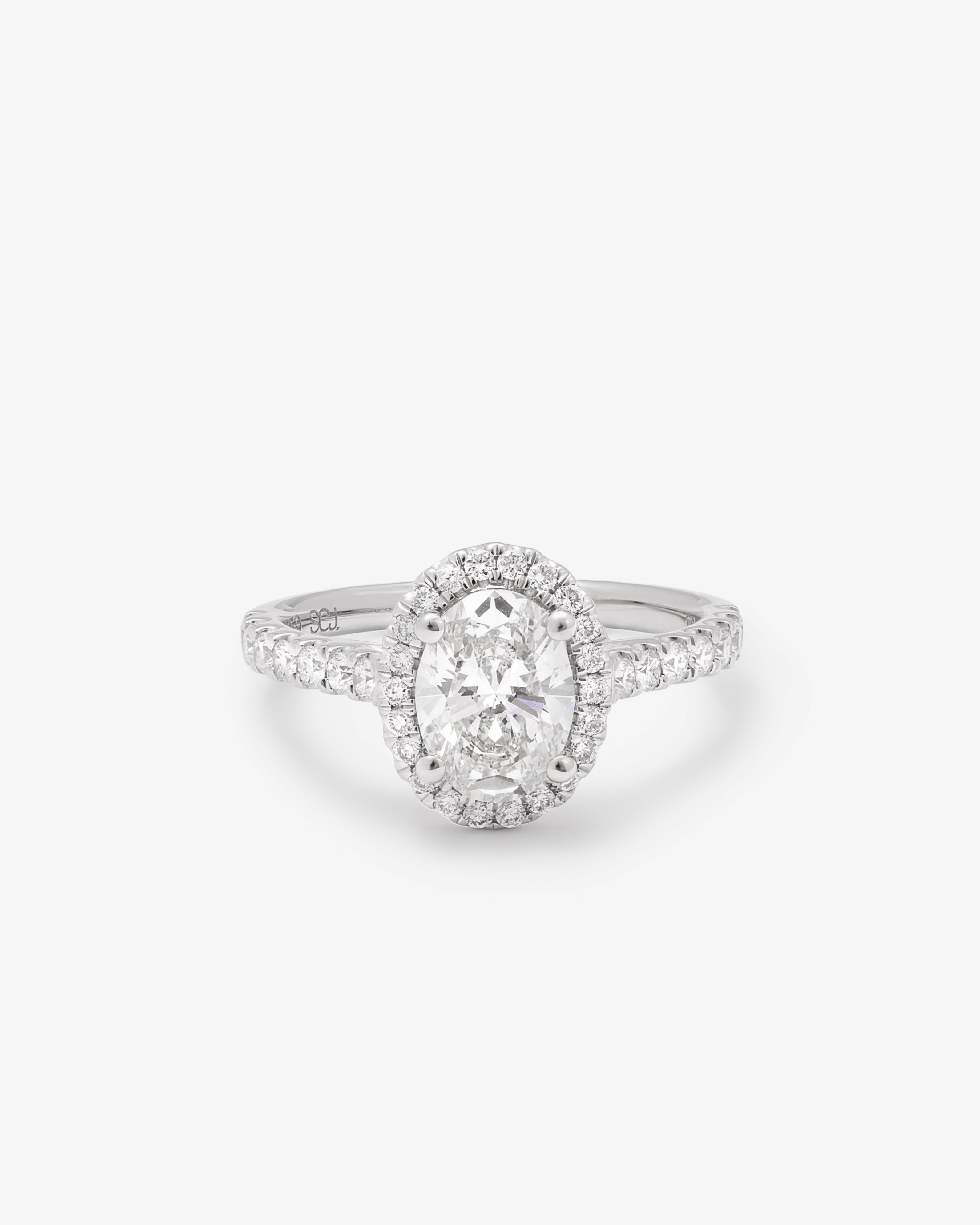 18K White Gold 1.5ct Oval Lab Diamond With Lab Diamond Halo And Shoulders Ring