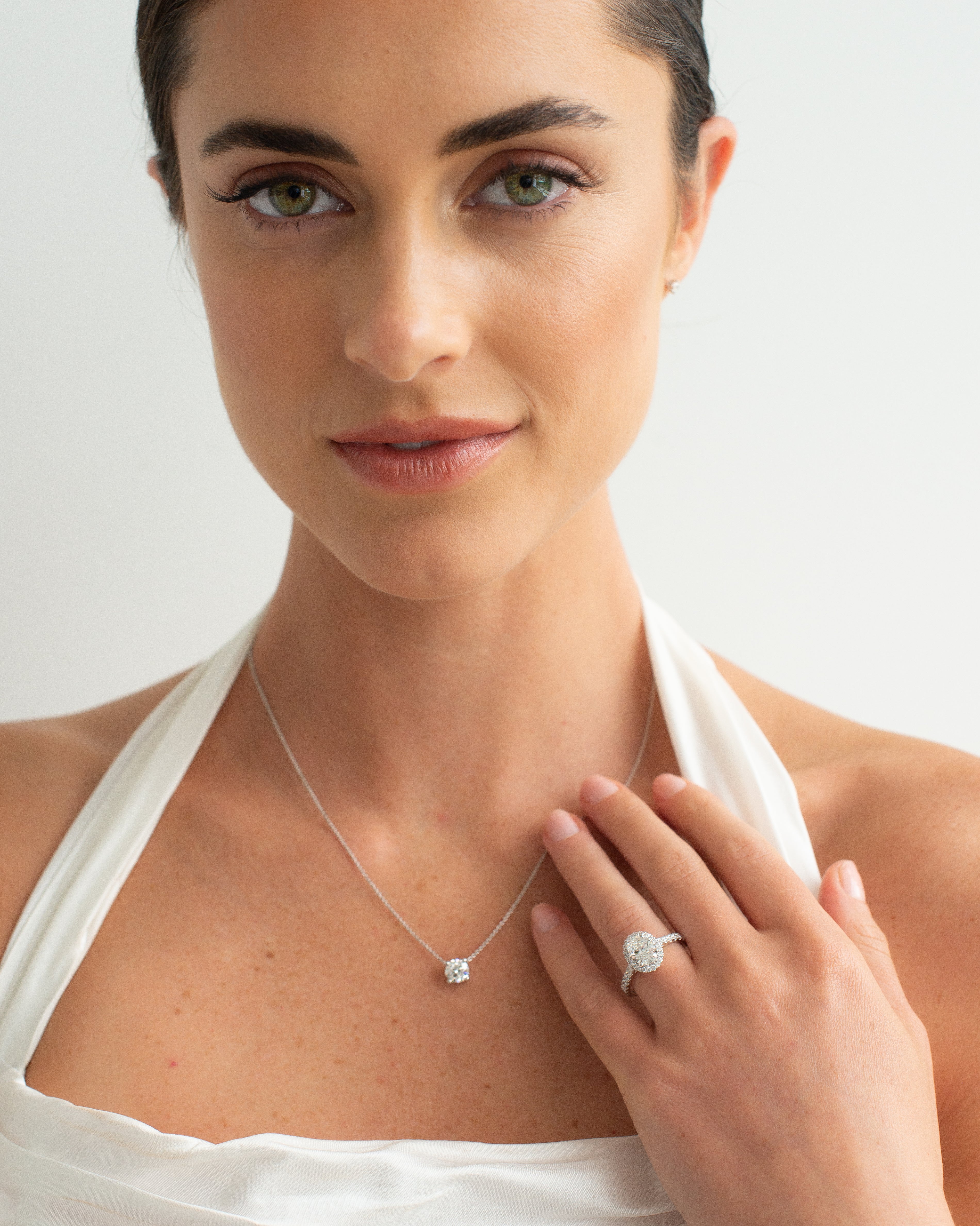 18K White Gold 1.5ct Oval Lab Diamond With Lab Diamond Halo And Shoulders Ring