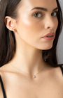 Gold Huggie Essential Earrings model shot