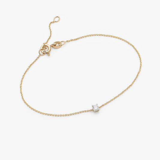 9Yw 0.11tdw round lab diamond claw set solitaire fine bracelet