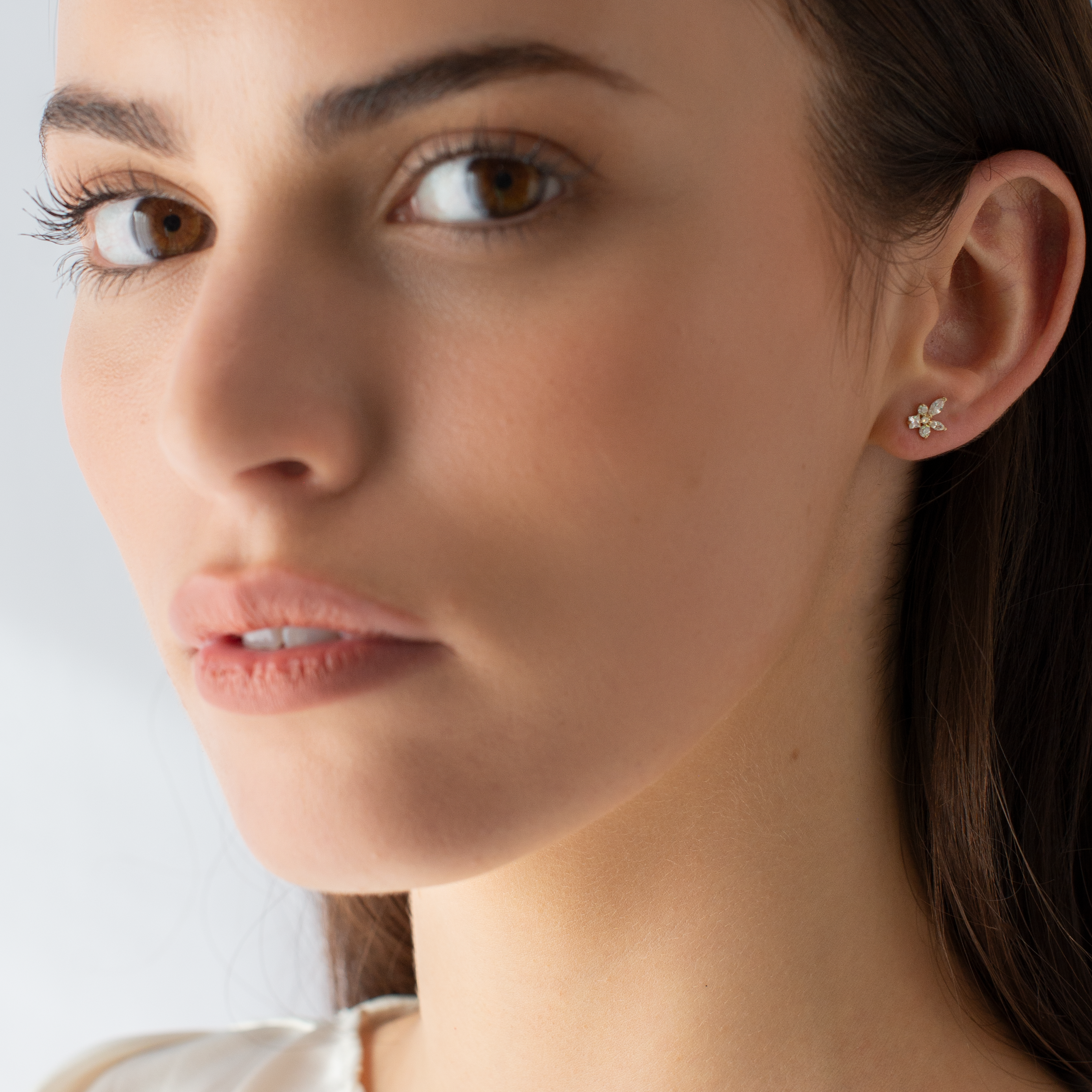 9k Yellow Gold Marquise Round and Princess Zirconia Cluster Stud Earrings model shot