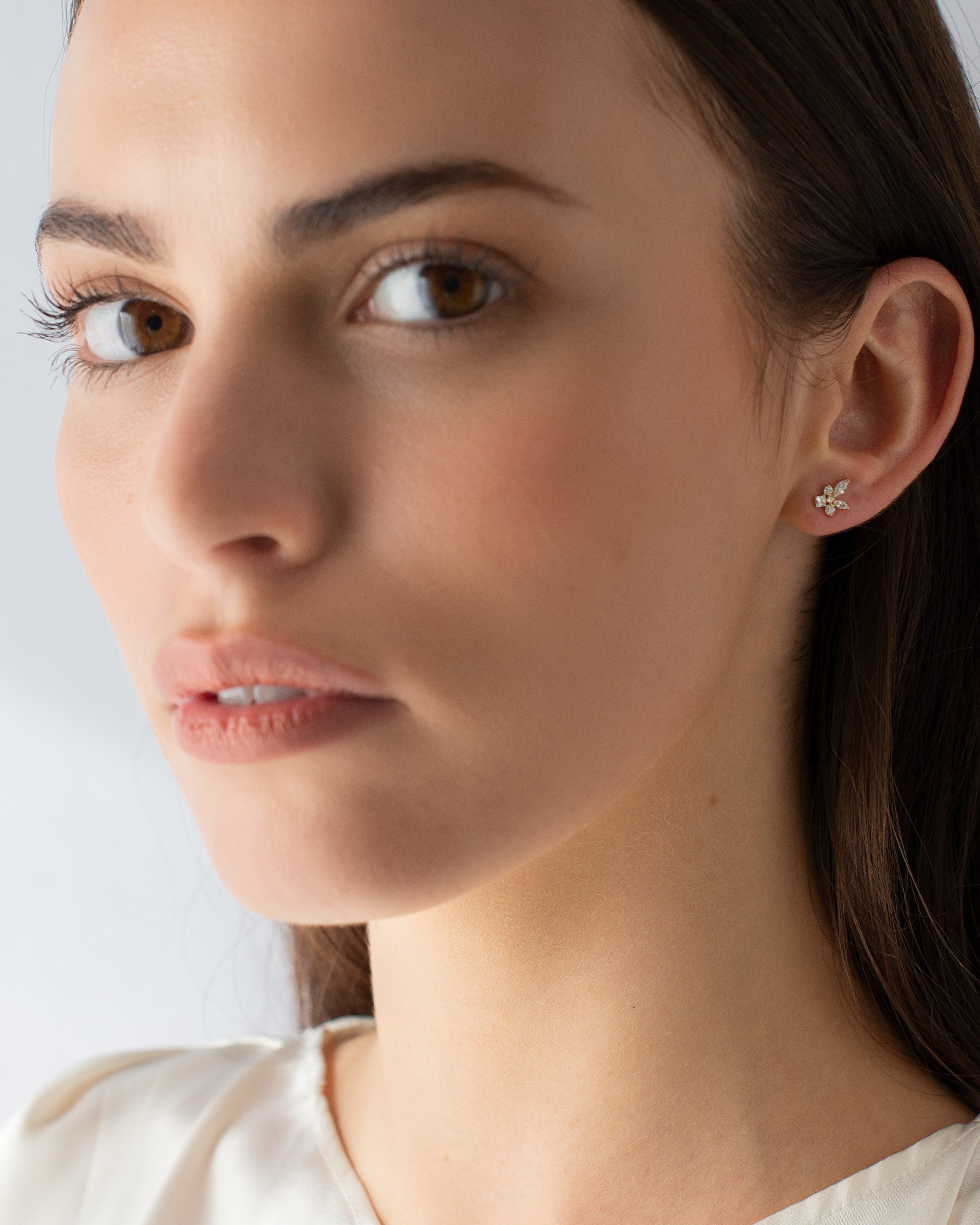 9k Yellow Gold Marquise Round and Princess Zirconia Cluster Stud Earrings model shot
