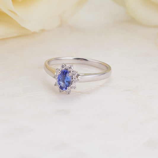 18K White Gold Petite Oval Tanzanite Diamond Halo Ring 0.12tdw