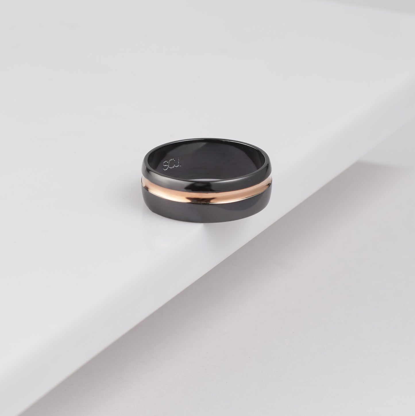 Black Zirconium Ring with an Offset Groove of Rose Gold