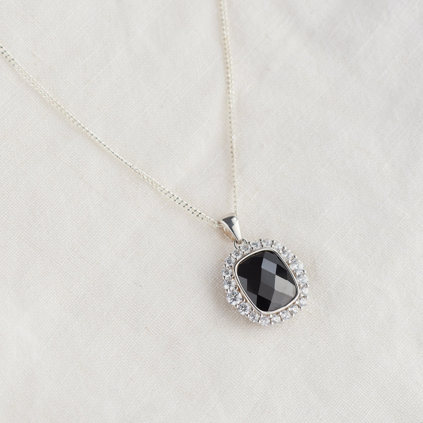 Sterling Silver Cushion Black and White Zirconia Pendant.
