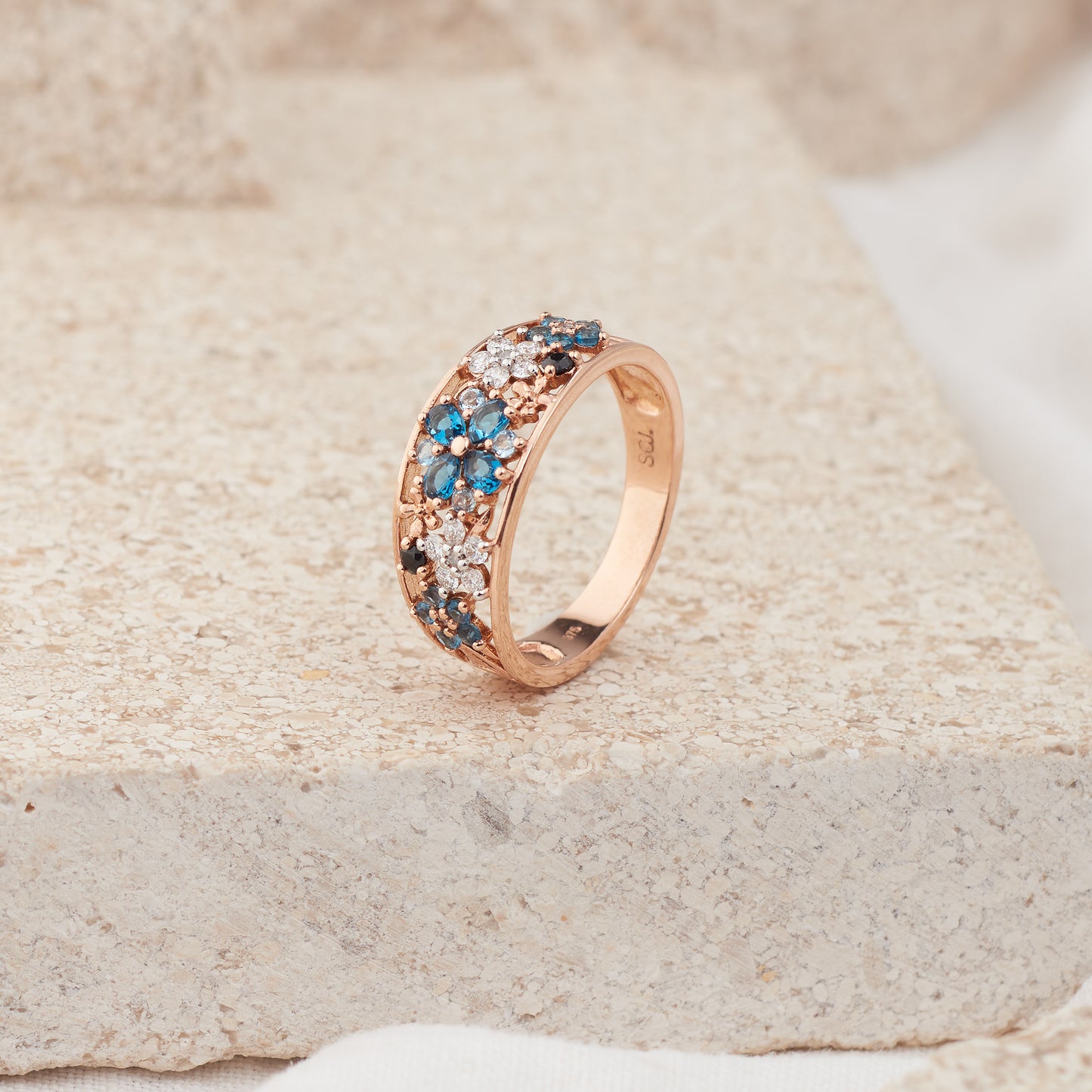 9K Rose Gold Blue Topaz, Black Sapphire and Diamond Flower Dress Ring
