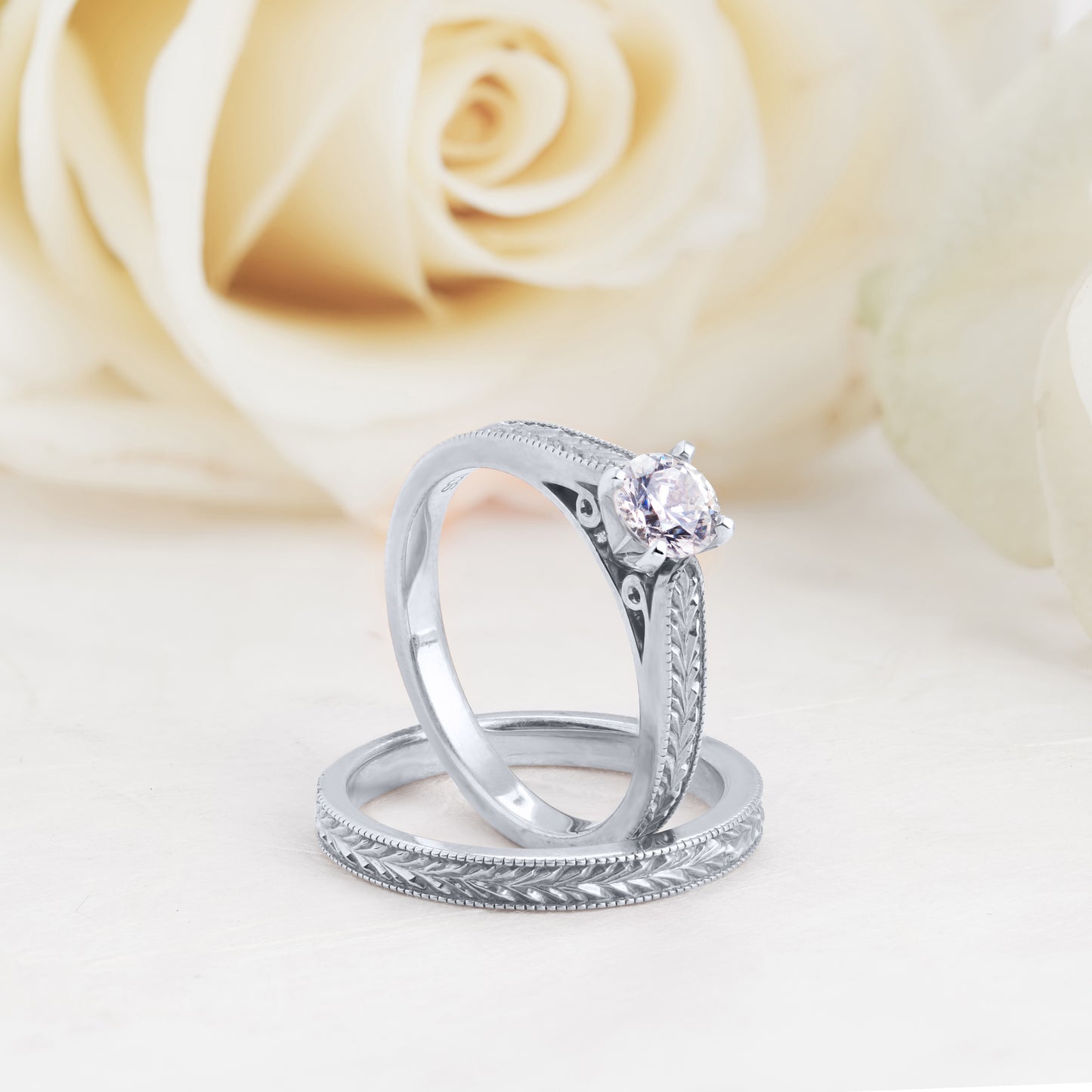 Platinum Round Brilliant Diamond Solitaire Engraved Bridal Set 0.5tdw