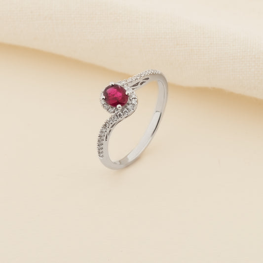 18K White Gold Oval Ruby and Diamond Swirl Halo Dress Ring 0.15tdw