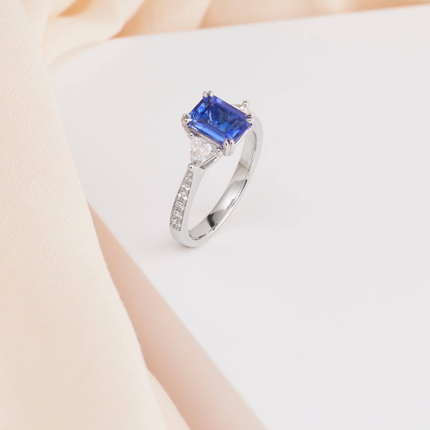 18K White Gold Emerald Cut Tanzanite and Trilliant Diamond Dress Ring