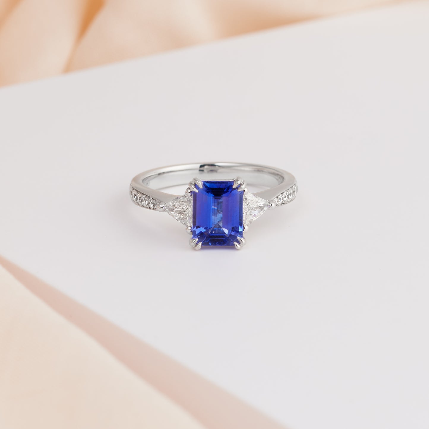 18K White Gold Emerald Cut Tanzanite and Trilliant Diamond Dress Ring