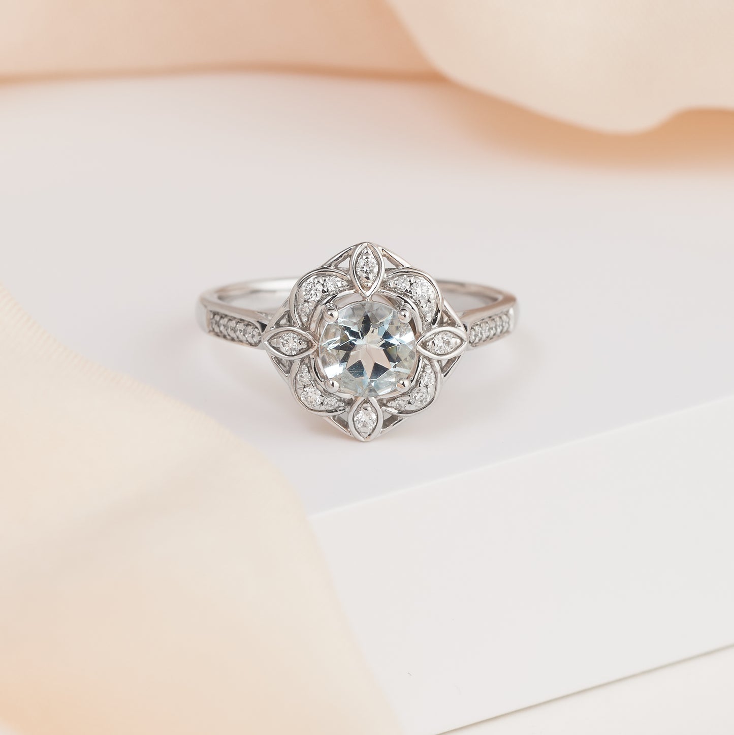 9K White Gold Aquamarine and Diamond Flower Halo Ring 0.15tdw