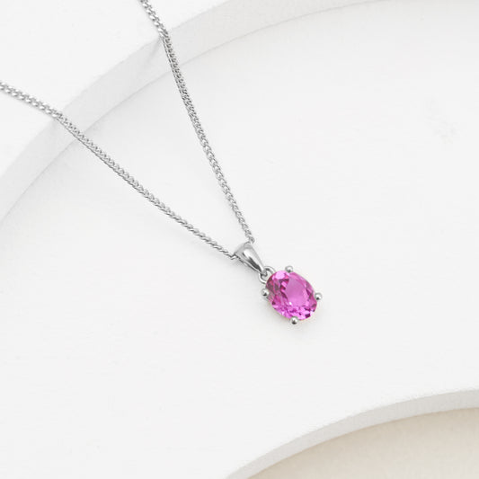 9K White Gold Oval Created Mulberry Sapphire Pendant