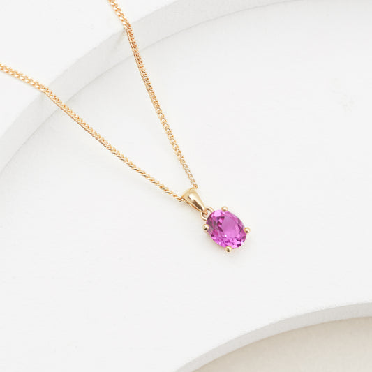 9K Yellow Gold Oval Created Mulberry Sapphire Pendant